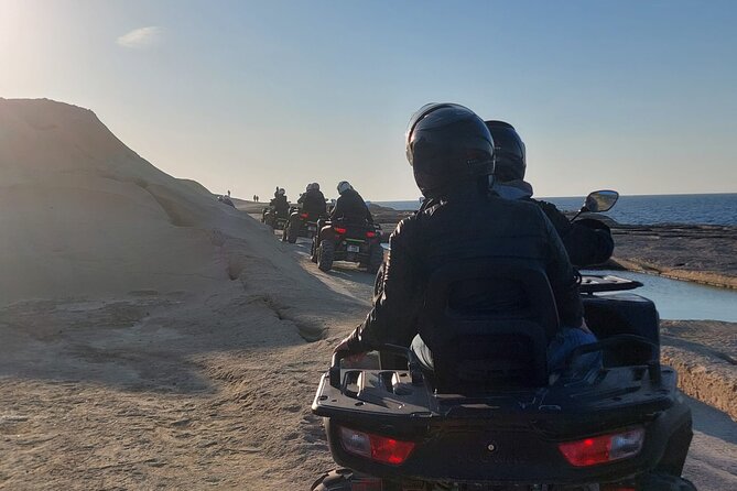 All Inclusive Blue Lagoon & Sunset Quad Tour in Gozo - Getting ready to drive a quad on Gozo