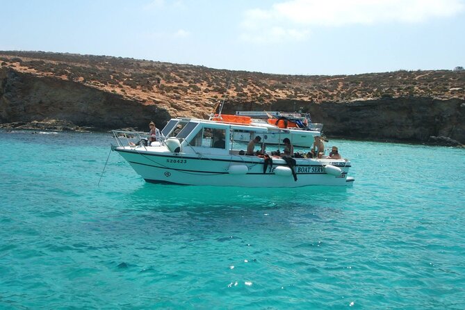 Comino and Gozo Private Boat Tour : Julie Pearl Boat - Crystal Lagoon and Comino’s cave country