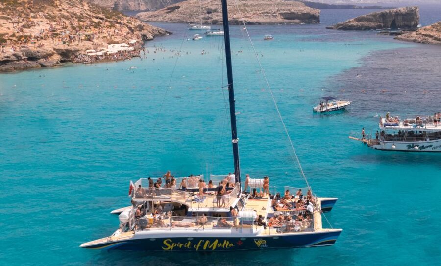 Comino: Blue Lagoon Catamaran Cruise with Lunch and Open Bar - Open bar and the changing music