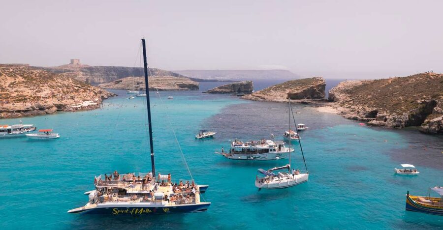Comino: Blue Lagoon Catamaran Cruise with Lunch and Open Bar - A boat made for sun, shade, and swimming