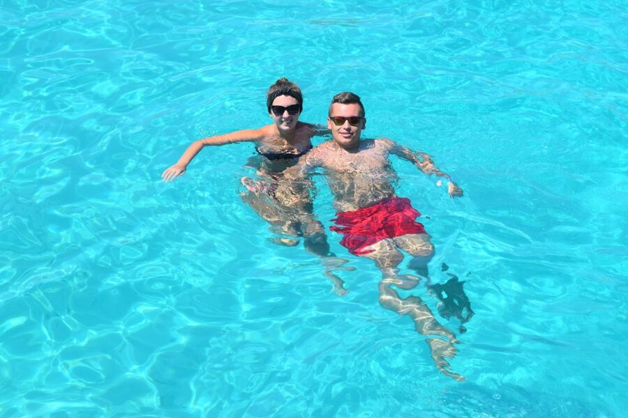 Comino: Blue Lagoon, Crystal Lagoon, and Seacaves Tour - Blue Lagoon, beautiful water and plenty of people