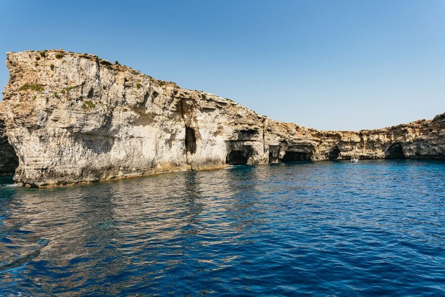 Comino: Blue Lagoon, Crystal Lagoon, and Seacaves Tour - The waterslide, swim ladders, and onboard fun