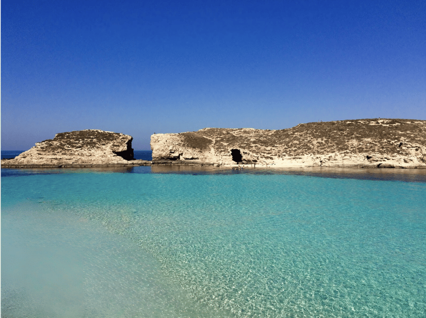 Comino's Best in a Flash: Caves, Coves & Beaches Boat Tour - Cominotto Island from the water