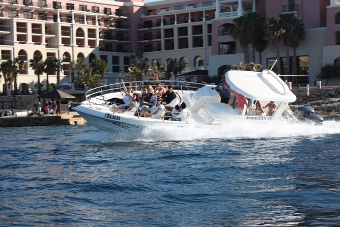 Comino, The Blue Lagoon & Caves Powerboat from St Julian's - Leaving St. George’s Bay on a high-speed boat