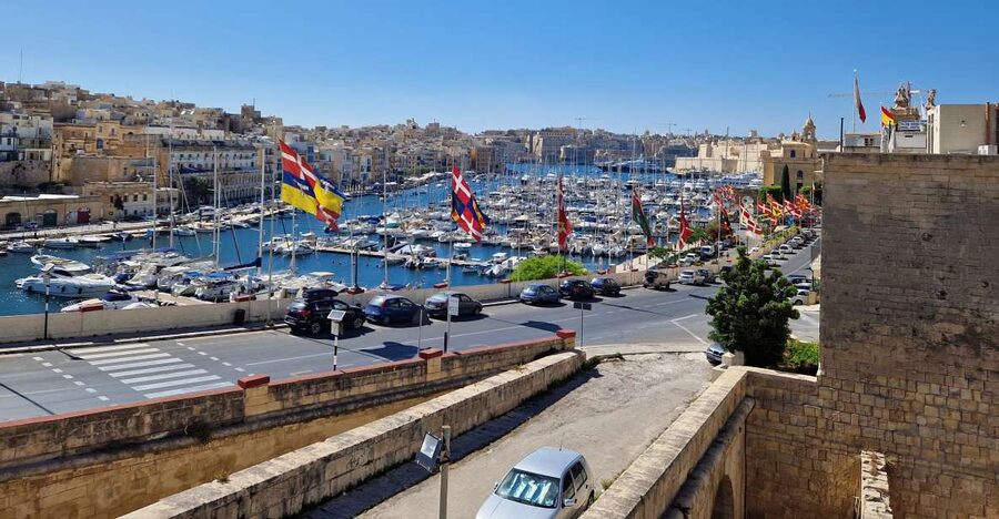From Cospicua: Senglea, Bormla, and Birgu Walking Tour - Crossing toward Birgu’s massive walls