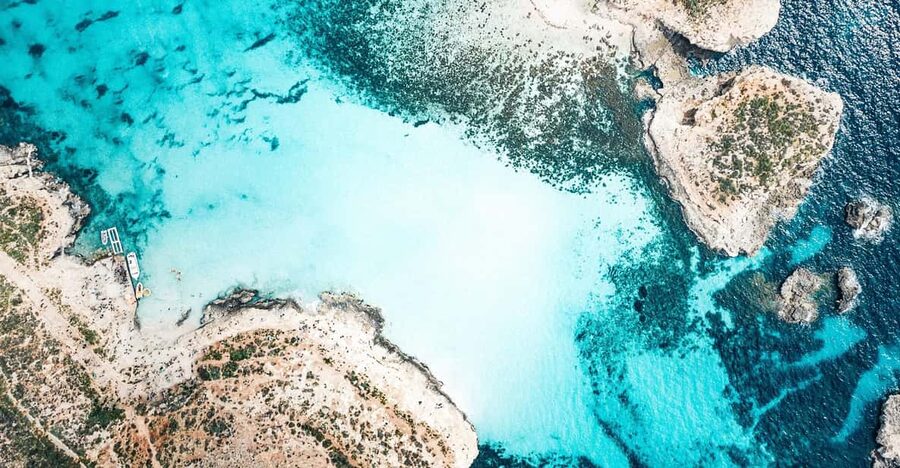 From Mellieha: Three Bay Cruise including the Blue Lagoon - Crystal Lagoon: the best stop for swimming and snorkeling