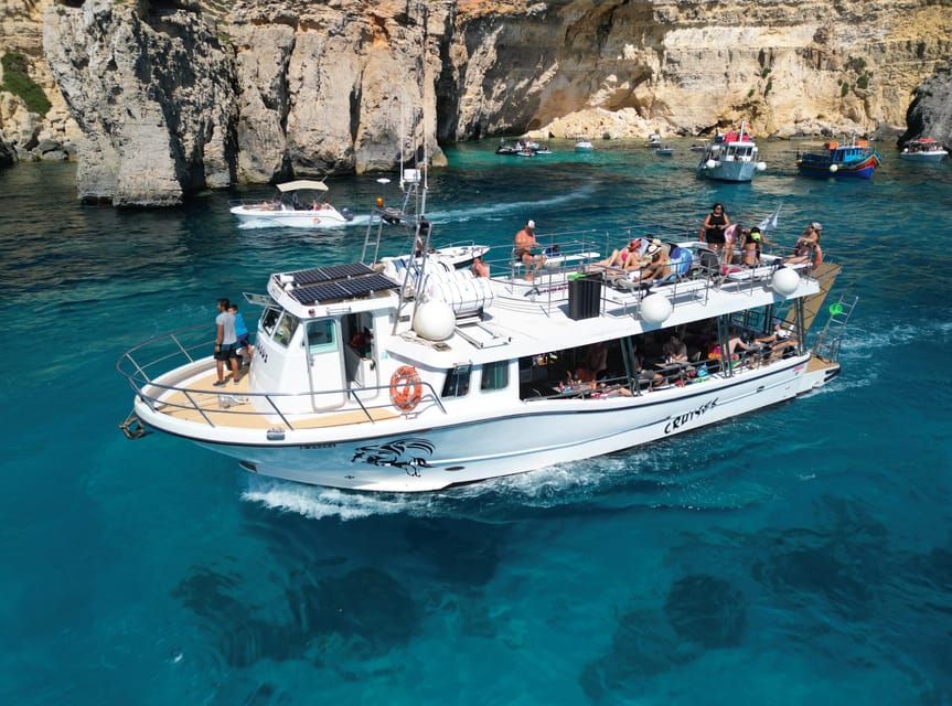 From Mellieha: Three Bay Cruise including the Blue Lagoon - Santa Maria Caves and Elephant Head on the way back
