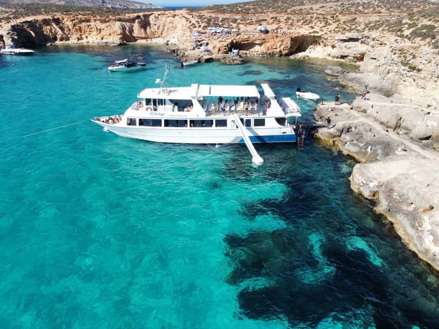 From Sliema: Comino, Crystal Lagoon, and Blue Lagoon Cruise - Blue Lagoon: beautiful, busy, and worth planning for