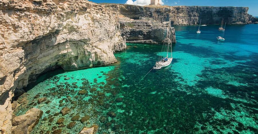From St. Julian's: Comino and Blue Lagoon Trip by Powerboat - Finding the jetty behind the marina hotel