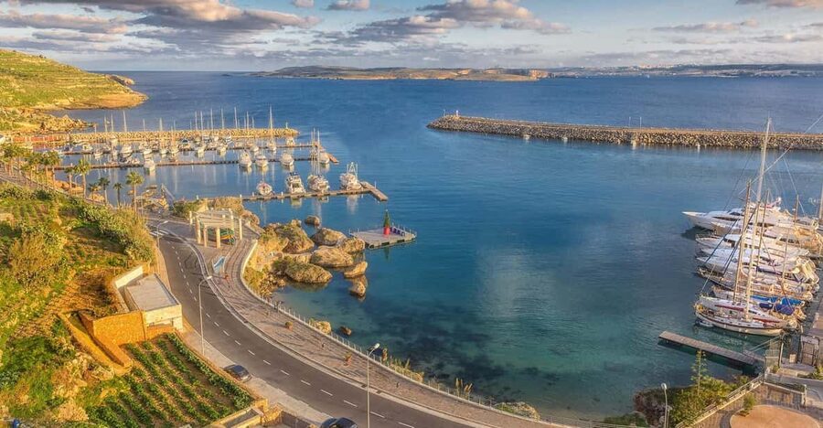 From St. Julian's: Gozo, Comino, Blue Lagoon by Powerboat - Finding the jetty behind St. George’s Bay