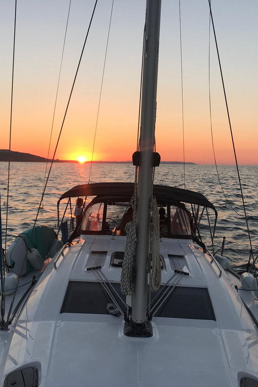 From Valletta: Romantic Sunset Cruise on a Sailing Yacht - The swimming stop and evening on anchor