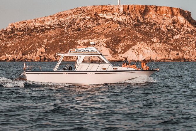 Malta: Around Comino Cruise With Blue Lagoon stop - Wine, water, and snorkeling gear included