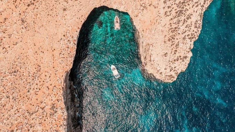 Malta: Blue Lagoon, Comino, Gozo & Crystal Lagoon Sea Caves - Crystal Lagoon and the water slide