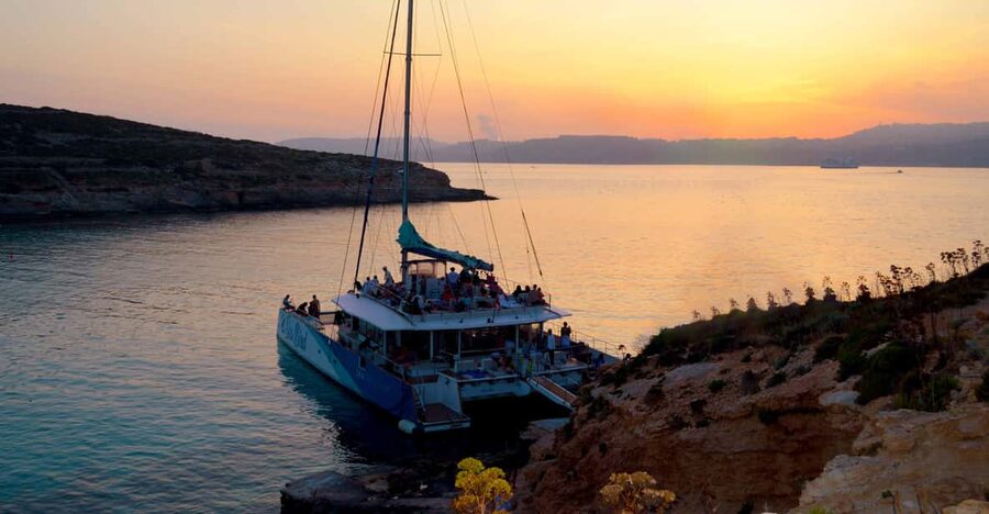 Malta: Blue Lagoon Evening Catamaran Cruise - From Bugibba Jetty to the open coast