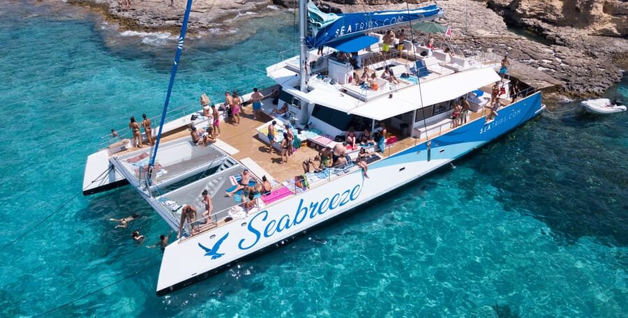 Malta: Blue Lagoon Evening Catamaran Cruise - Crystal Lagoon, caves, and the optional BBQ