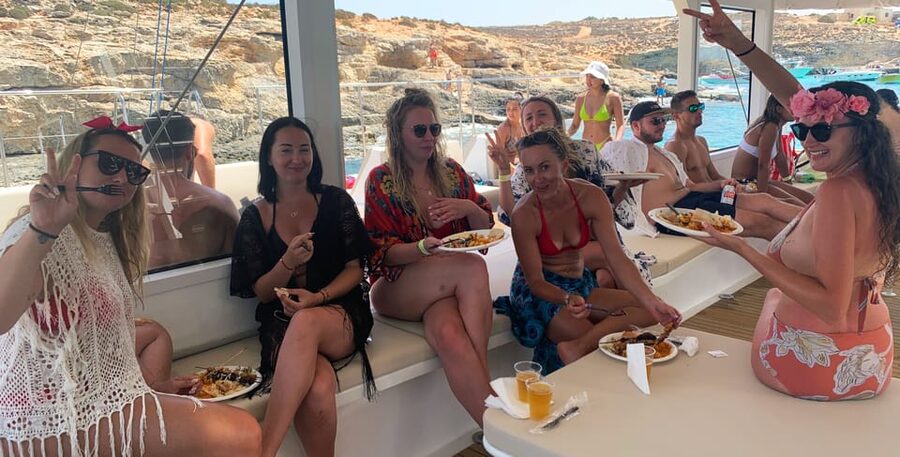 Malta: Blue Lagoon Evening Catamaran Cruise - Anchor Bay and the changing secondary route