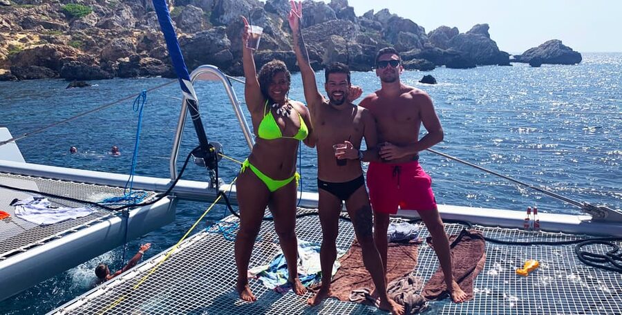 Malta: Blue Lagoon Evening Catamaran Cruise - Music, cocktails, and the sunset return