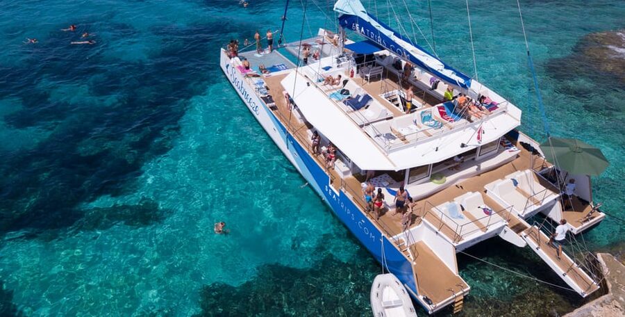 Malta: Blue Lagoon Evening Catamaran Cruise - Malta’s coast from the catamaran
