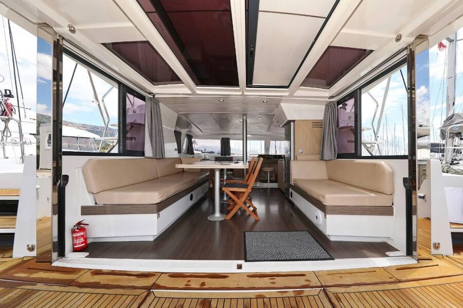 Malta: Catamaran Private Day Charter with Skipper - Swimming, snorkeling, and paddleboarding