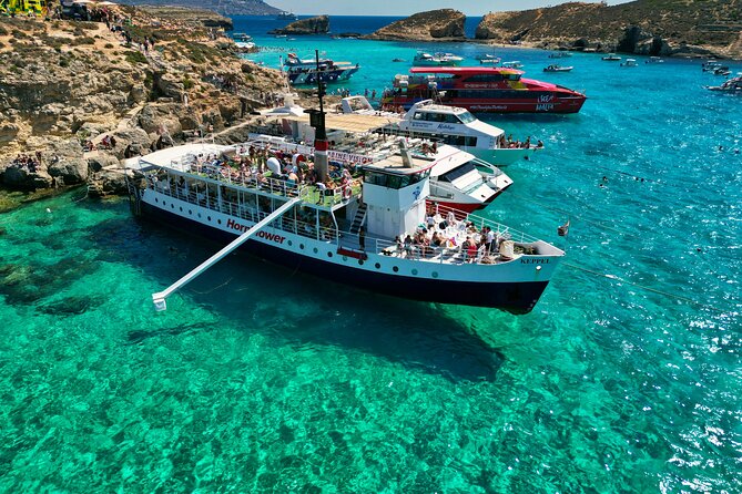 Malta: Comino, Blue Lagoon & Caves - swim, snorkel & slide - Leaving Bugibba at 10am