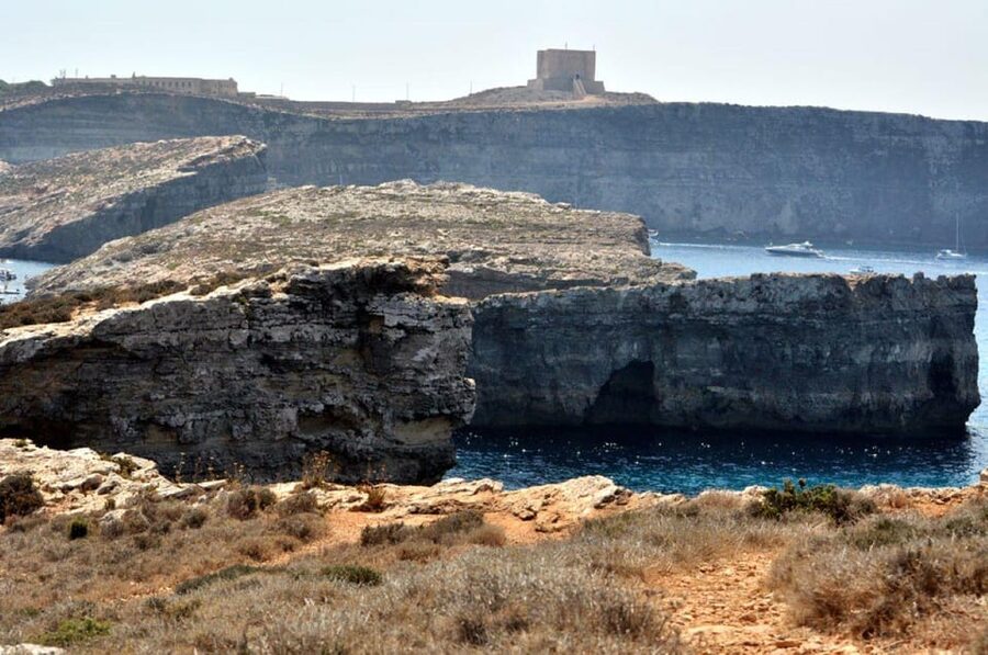 Malta: Gozo Comino and Blue Lagoon Boat Tour with Swim Stop - Comino’s towers, batteries, and sea caves