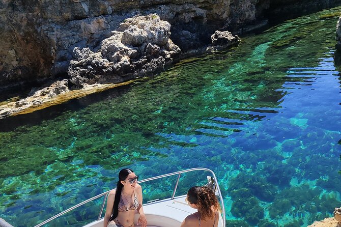 MALTA-Gozo Comino Caves Crystal Blue Lagoon Private Boat Trips - Crystal Lagoon: cliffs, clear water, and snorkeling