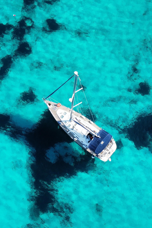 Malta Gozo Comino: Full Day Sailing Charter - Swimming in clear water and exploring by kayak