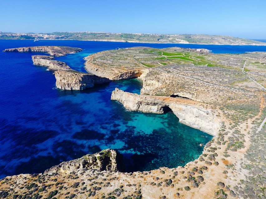 Malta: Private Boat Charter to Blue-Lagoon, Gozo & Comino - Setting off toward Lantern Point and Comino