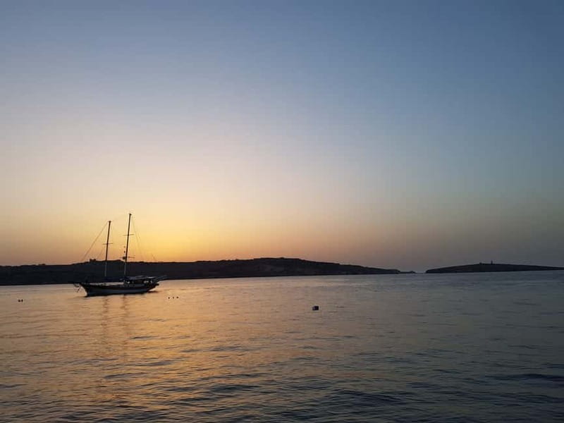 Malta: Sunset Cruise to Blue Lagoon and Caves - The Crystal Lagoon photo stop
