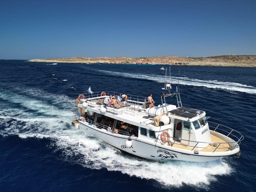 Mellieha: Two Bay Evening Cruise Including The Blue Lagoon - Blue Lagoon: famous water, new access rules