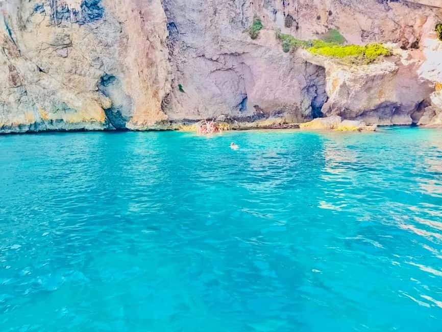 Mgarr/Cirkewwa: Comino, Gozo & Blue Lagoon Private Boat Trip - Comino’s caves and narrow coastal passages