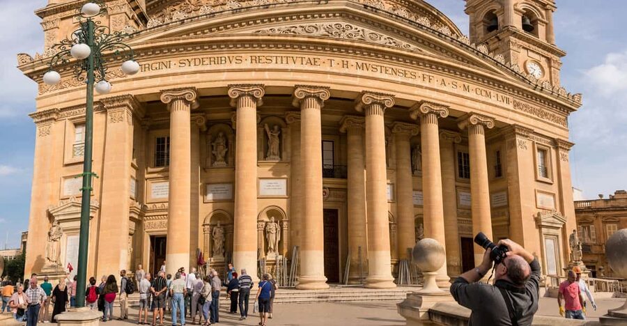 Mosta: City Highlights Tour with Buffet Lunch - Walking through Malta’s wartime shelter