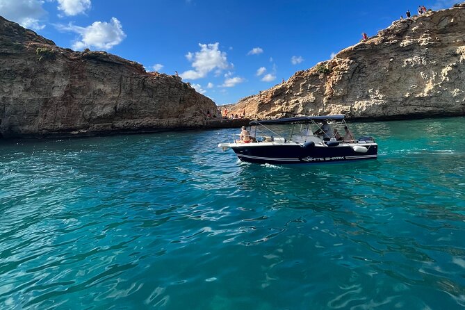 Private Boat Charter Blue Lagoon Crystal Lagoon and Comino - Stop one: Blue Lagoon from the water