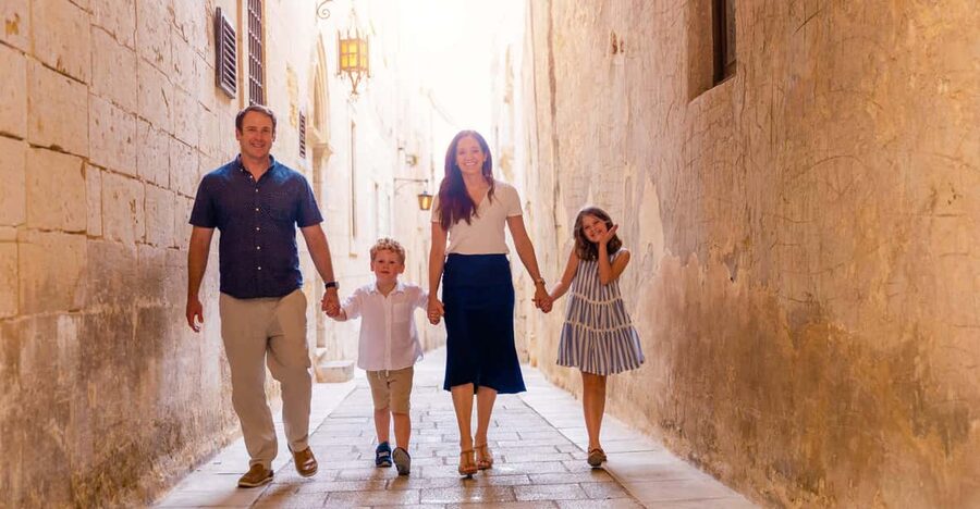 Private Photoshoot in Malta - Walking through Valletta from Triton Fountain