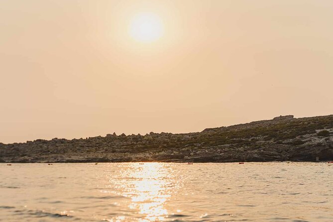 Private Speedboat 2hrs Crystal & Blue Lagoon Caves & Snorkelling - Cominotto Reef and the view across the water