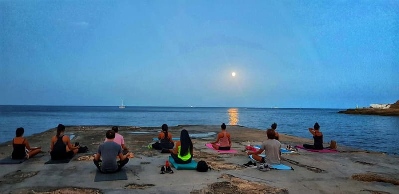 Sliema: Beach Yoga Class with Swimming - Sun Salutations, Balance, and Strength