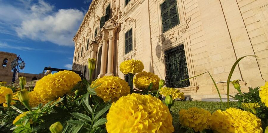 Valletta: Private Maltese Cuisine Walking Tour - Imqaret beside Valletta’s historic architecture